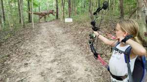 Girl shooting at 3 D dino f4159788da6a13a05c7755e7e3b29890 210518 122501