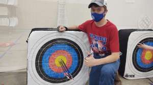 Masked kid with target f4159788da6a13a05c7755e7e3b29890